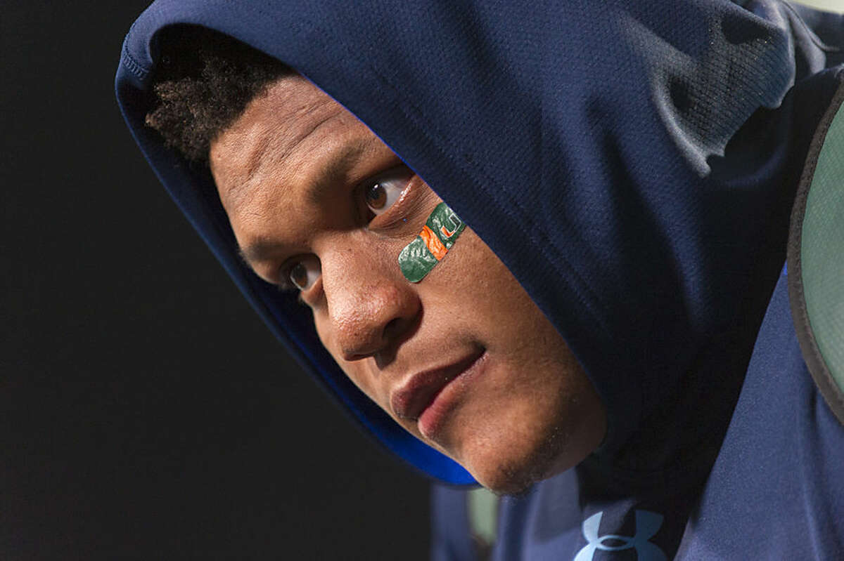 Miami offensive lineman Ereck Flowers talks with the media during a news conference at the NFL football scouting combine at Lucas Oil Stadium in Indianapolis, Friday, Feb. 20, 2015. (AP Photo/Doug McSchooler)