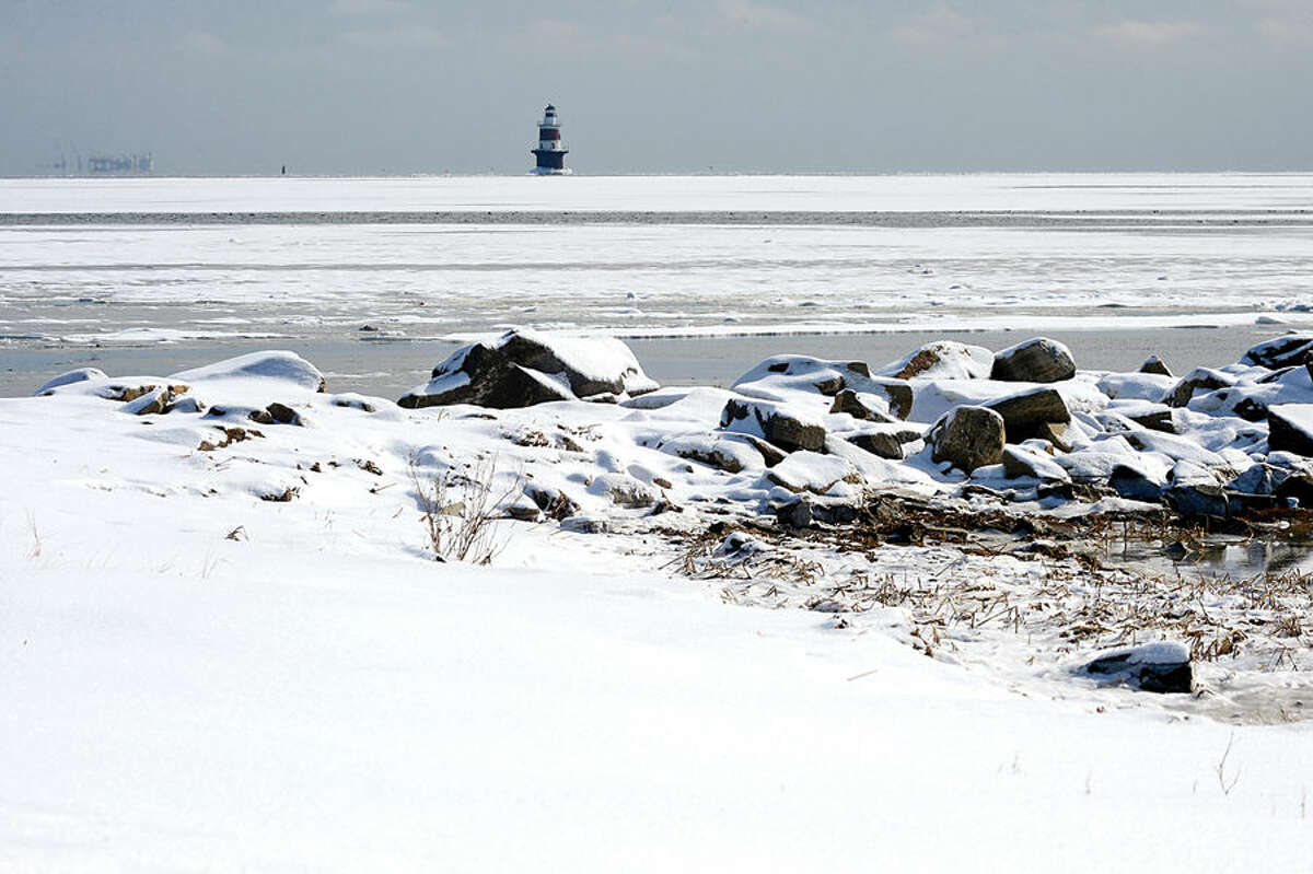 Hour photo / Erik Trautmann Long Island Sound appears frozen over as temperatures dipped near zeron this week.