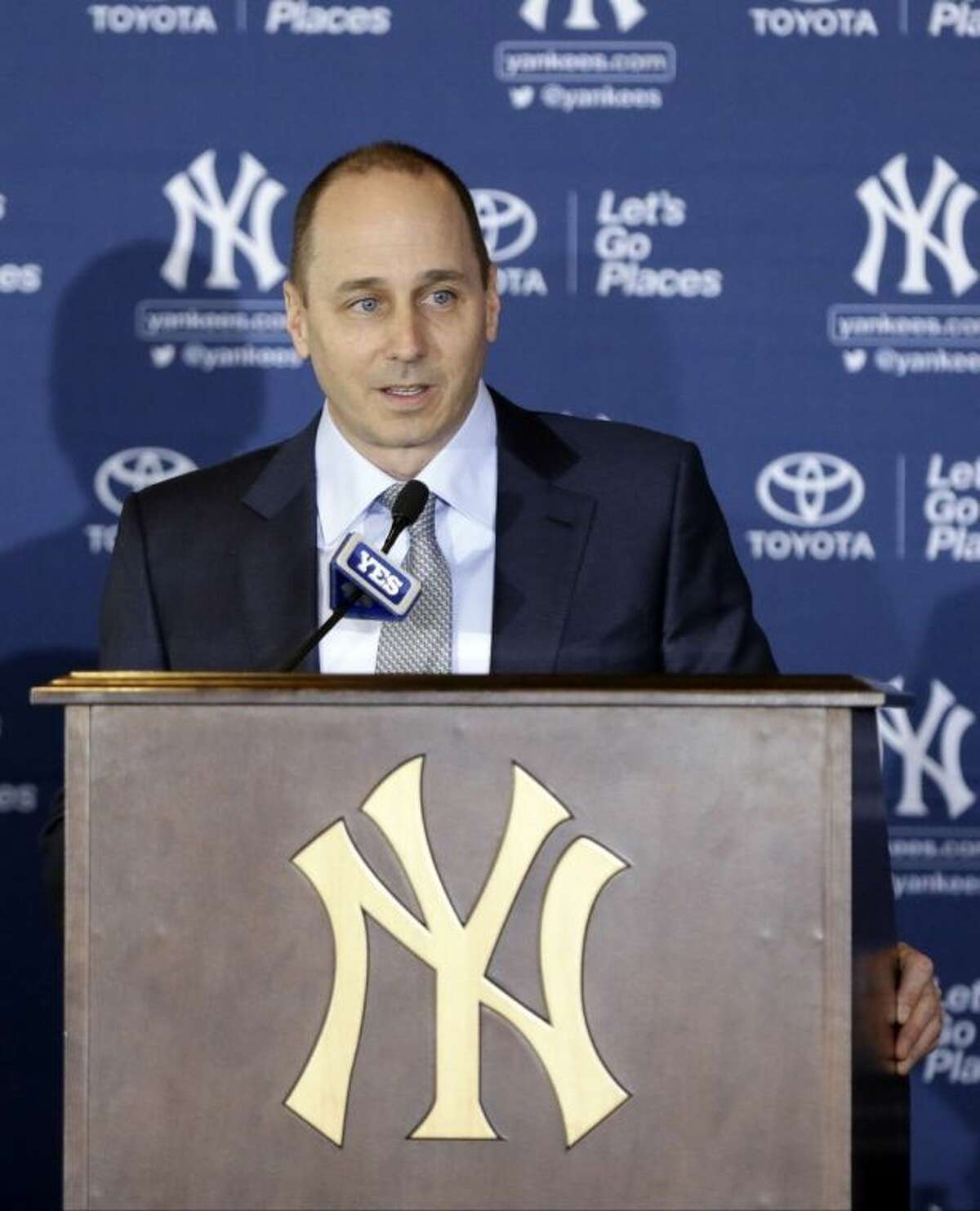 New York Yankees general manager Brian Cashman speaks during a news conference, where Masahiro Tanaka of Japan was introduced as a new pitcher for the team, at Yankee Stadium Tuesday, Feb. 11, 2014, in New York. (AP Photo/Frank Franklin II)