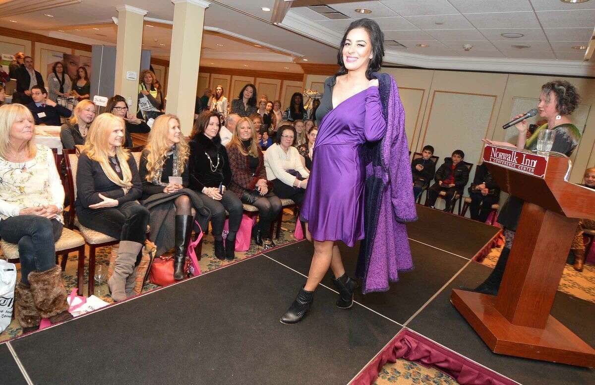 Hour Photo/Alex von Kleydorff The latest designs from Jennifer Butler on the runway at Beauty and the Bubbly Friday night at The Norwalk Inn and Conference Center
