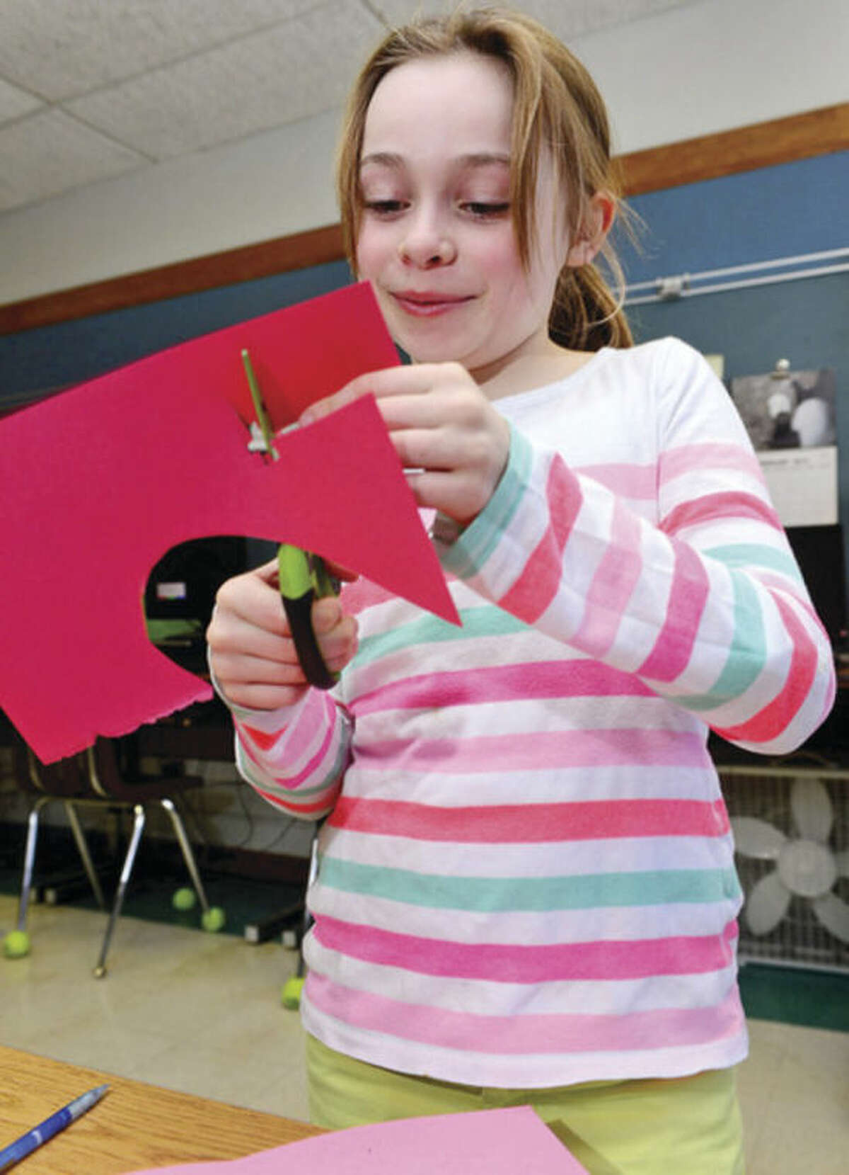 Hour photo / Erik Trautmann Rowayton Elementary School 4th graders is Maura Fried's class make valentines Tuesday for veterans at the VA Hospital in West Haven.