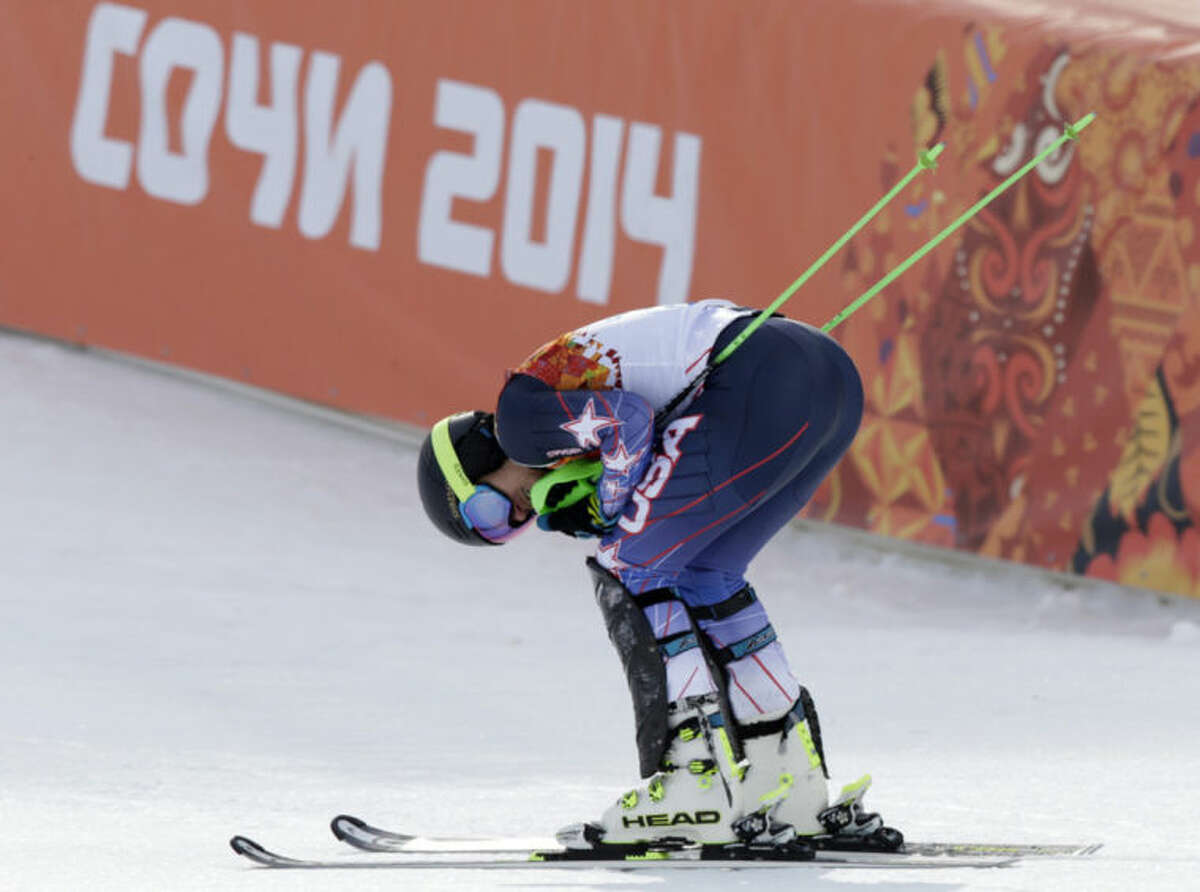 United States' Ted Ligety rests after finishing the slalom portion of the men's supercombined at the Sochi 2014 Winter Olympics, Friday, Feb. 14, 2014, in Krasnaya Polyana, Russia. (AP Photo/Gero Breloer)