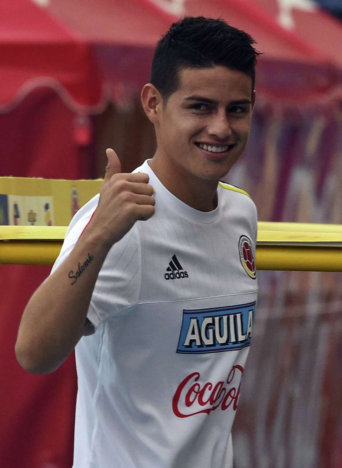 Colombia's national football team player, James Rodriguez smiles during a training session at the Metropolitano Stadium in Barranquilla on March 26, 2016. Colombia will face Ecuador on March 29 in Barranquilla in a FIFA World Cup Russia 2018 South American qualifier. AFP PHOTO/Luis AcostaLUIS ACOSTA/AFP/Getty Images