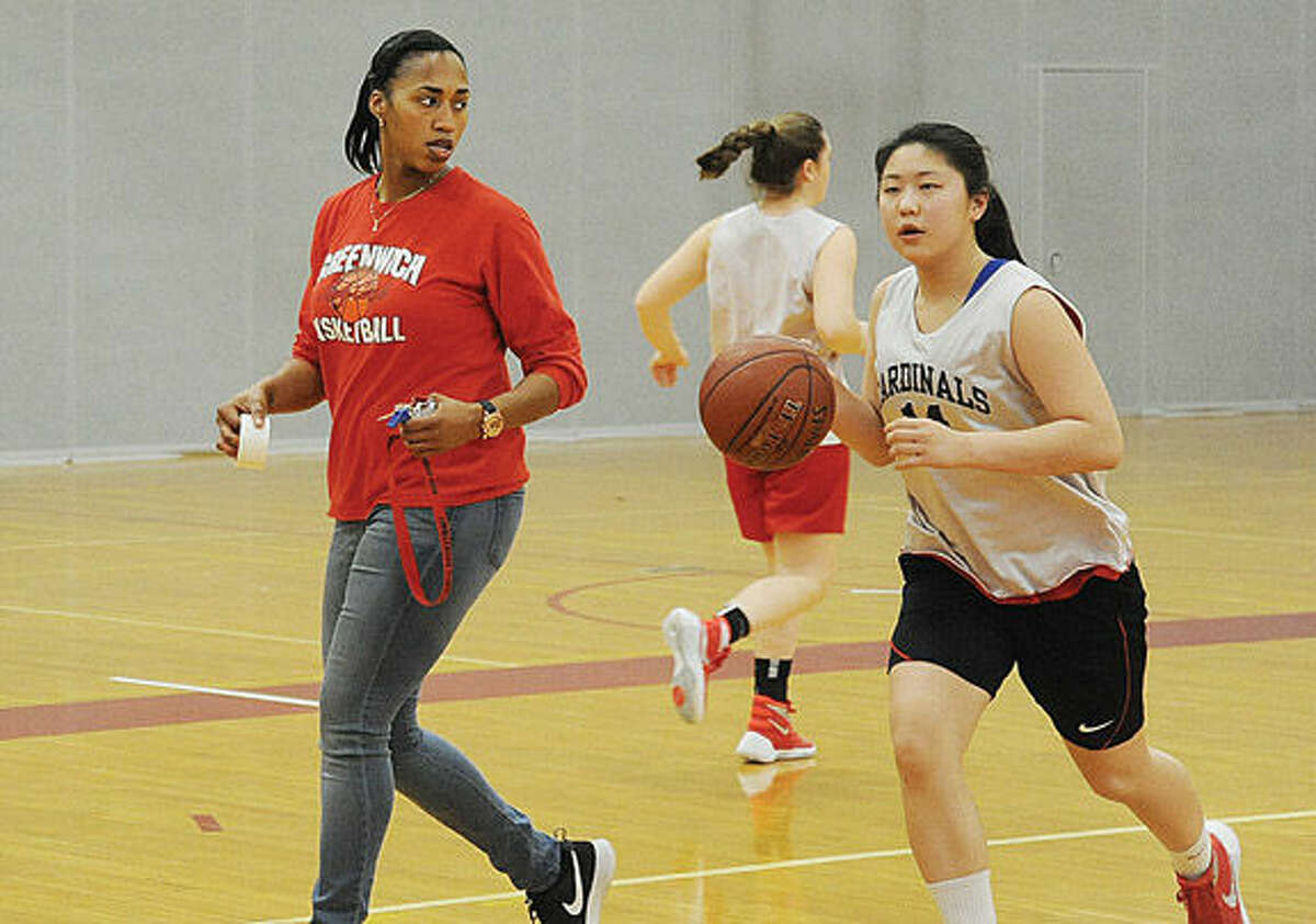 Chrys Hernandez, a 2001 graduate of Brien McMahon, where she played basketball and helped lead the Senators to the state finals is now the head coach of the Greenwich High girls basketball team. Hour photo/Matthew Vinci
