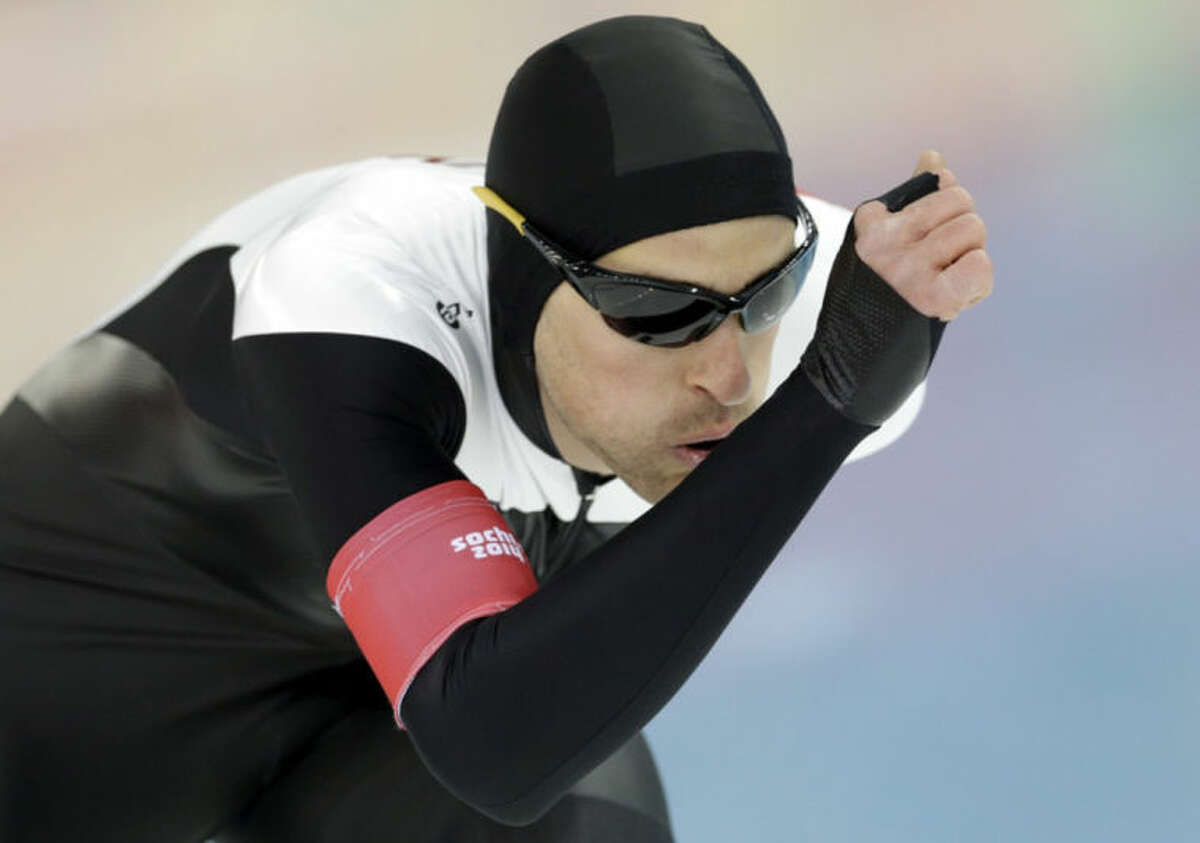 Canada's Denny Morrison competes in the men's 1,500-meter speedskating at the Adler Arena Skating Center during the 2014 Winter Olympics in Sochi, Russia, Saturday, Feb. 15, 2014. (AP Photo/Patrick Semansky)