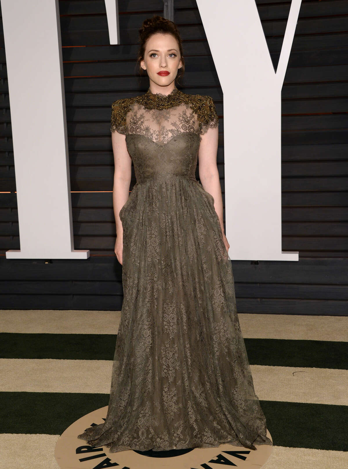 Kat Dennings arrives at the 2015 Vanity Fair Oscar Party on Sunday, Feb. 22, 2015, in Beverly Hills, Calif. (Photo by Evan Agostini/Invision/AP)