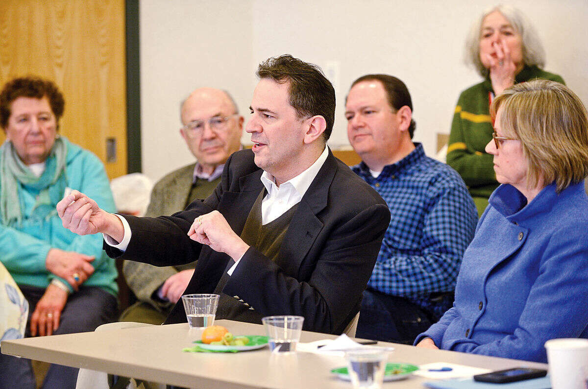 Hour photo / Erik Trautmann Norwalk State legislators including Representatives Chris Perone and Terrie Wood answer questions and talk about the current legislative session during The League of Women Voters of Norwalk annual Pie and Politics event Saturday, March 19, 2016 in the Norwalk Police Department Community Room.