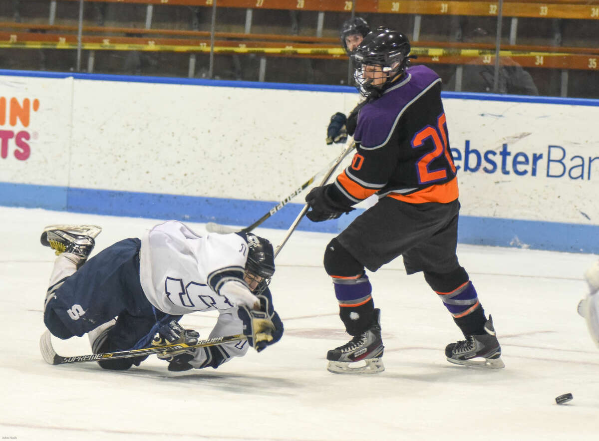 Hour photo/John Nash - The Westhill-Stamford co-op defeated Staples-Weston-Shelton by a 5-4 score on Saturday at Yale University's Ingalls Rink to win the CIAC Division 3 state championship.