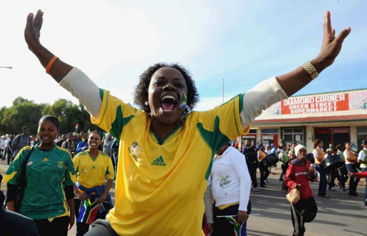 KIMBERLEY, SOUTH AFRICA - APRIL 21: (NO SALES) In this handout image provided by the 2010 FIFA World Cup Organising Committee South Africa, fans celebrate the 50 Day Countdown to the start of the FIFA 2010 World Cup soccer tournament on April 21, 2010 in Kimberley, South Africa. (Photo by 2010 FIFA World Cup Organising Committee South Africa via Getty Images)