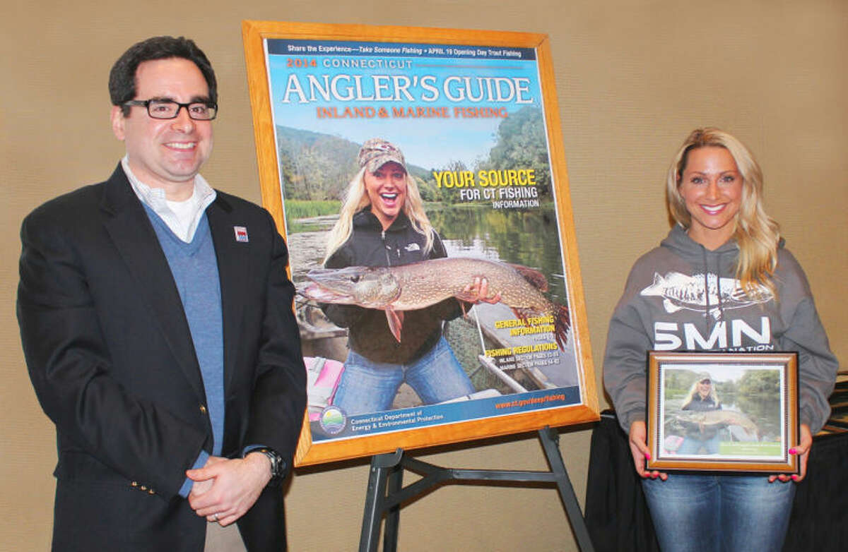 Connecticut Department of Energy and Environmental Protection (DEEP) Commissioner Rob Klee and Andrea Repko, 2014 Angler's Guide Cover Photo Contest winner.