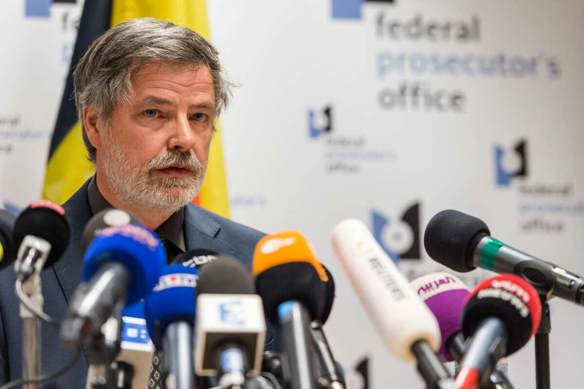 Spokesman for the Belgian Federal Prosecutors Office Eric Van Der Sypt addresses the media during a press conference in Brussels on Friday April 8, 2016. The prosecutor's office confirmed a fugitive suspect in the Nov. 13 Paris attacks was arrested in Belgium on Friday, after a raid Belgian authorities said was linked to the deadly March 22 Brussels bombings. The suspect, Mohamed Abrini, is believed to be the mysterious "man in the hat" who escaped the double bombing at Brussels airport, but further investigation is needed to determine Abrini is the third suspect of the airport attack. (AP Photo/Geert Vanden Wijngaert)