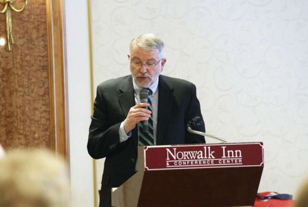Jeffrey S. Smith accepts his induction to the Norwalk High School Alumni Association's Honor Roll Sunday afternoon at The Norwalk Inn. Hour Photo / Danielle Calloway
