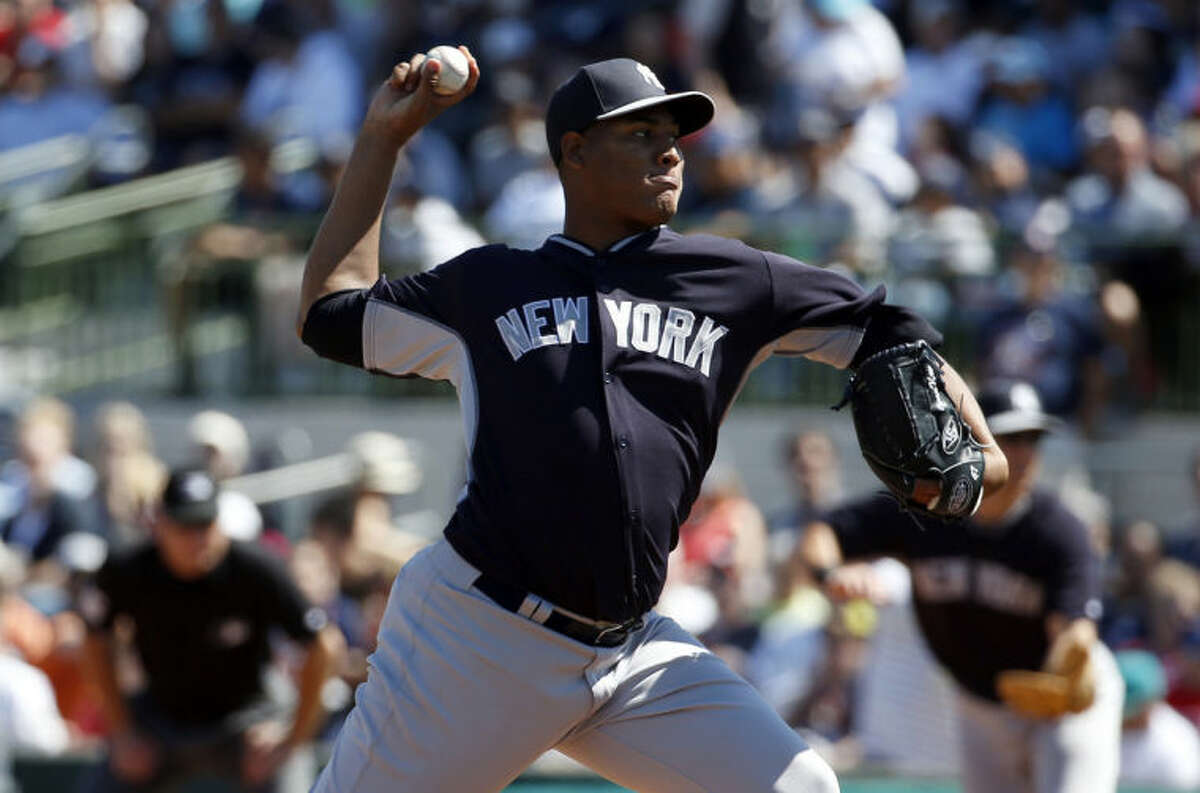 New York Yankees starting pitcher Ivan Nova (47) throws in the first inning of a spring exhibition baseball game against the Houston Astros, Saturday, March 8, 2014, in Kissimmee, Fla. (AP Photo/Alex Brandon)
