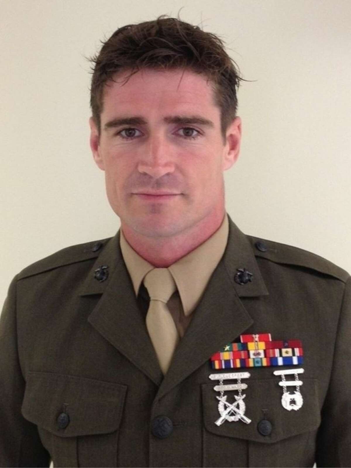 This image provided by the U.S. Marine Corps shows an undated photo of Staff Sgt. Liam Flynn, 33. Friday, March 13, 2015, military officials released the names of the Marines killed. All were from the 2nd Special Operations Battalion of the Marine Corps Special Operations Command, or MARSOC, at Camp Lejeune. Staff Sgt. Flynn was one of the seven Marines killed when the Black Hawk helicopter crashed in dense fog during a training mission in Florida. (AP Photo/US Marine Corps)
