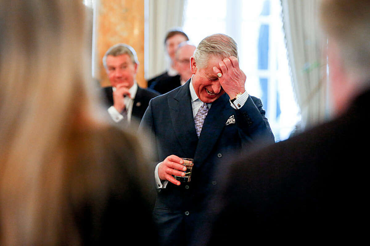 Britain’s Prince Charles laughs as British Ambassador to the United States Sir Peter Westmacott gives welcoming remarks during a private reception at the British Ambassador's Residence on Wednesday, March 18, 2015 in Washington. (AP Photo/Andrew Harnik)