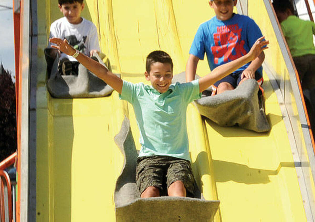 Lorenzo Zullo 11, on the Super Slide Sunday at the Oyster Festival. Hour photo/Matthew Vinci