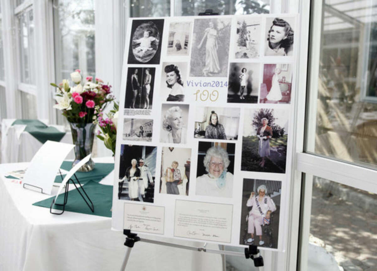 A photo collage of Vivian Salvatore, Former Miss Roton Point (1931), on display at her 100th birthday celebration at the Norwalk Inn Sunday afternoon. Hour Photo / Danielle Calloway