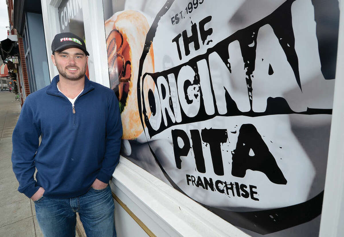 Owner Matt Stockel stands in front of his new sandwich shop Pita Pit, which is set to open in April.