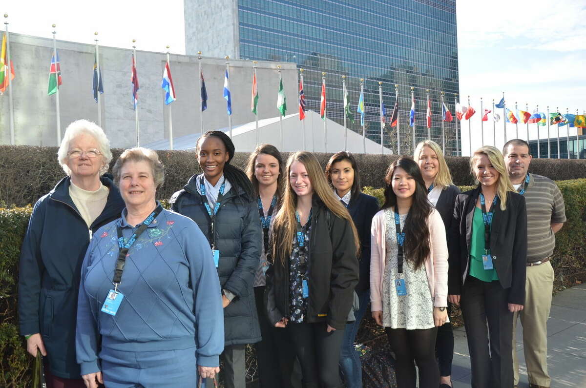 from left: Sister Eileen Reilly, SSND UN-NGO representative; Sister Kathy Jager, teacher at Institute of Notre Dame (IND); Micayla Wilson, IND student; Caitlyn Lowry, student at Notre Dame High School (NDHS); Corey Fletcher, IND student; Mariajose Ortiz, NDHS student; Linda Pham, NDHS student; Sandy Wilson, NDHS staff; Allison Moser, NDHS student; and Anthony Smith, NDHS teacher.