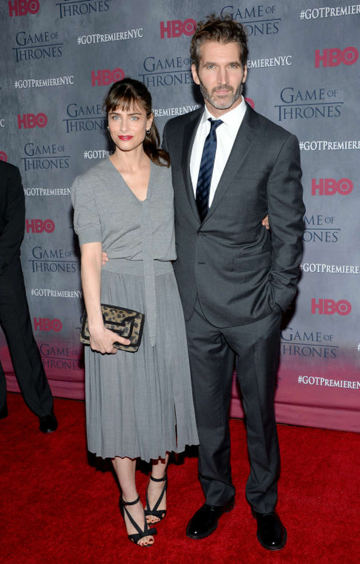 Actress Amanda Peet with husband creator and executive producer David Benioff attend HBO's "Game of Thrones" fourth season premiere at Avery Fisher Hall on Tuesday, March 18, 2014 in New York. (Photo by Evan Agostini/Invision/AP)