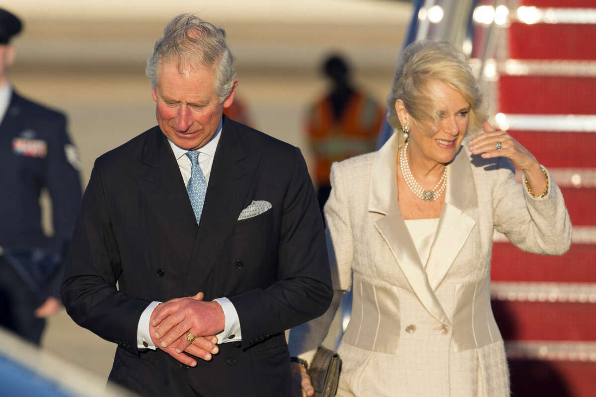 Britain's Prince Charles and the Duchess of Cornwall, arrive at Andrews Air Force Base, on Tuesday, March 17, 2015, in Andrews Air Force Base, Md. The couple is scheduled to visit cultural and educational sites over the next three days. (AP Photo/ Evan Vucci)