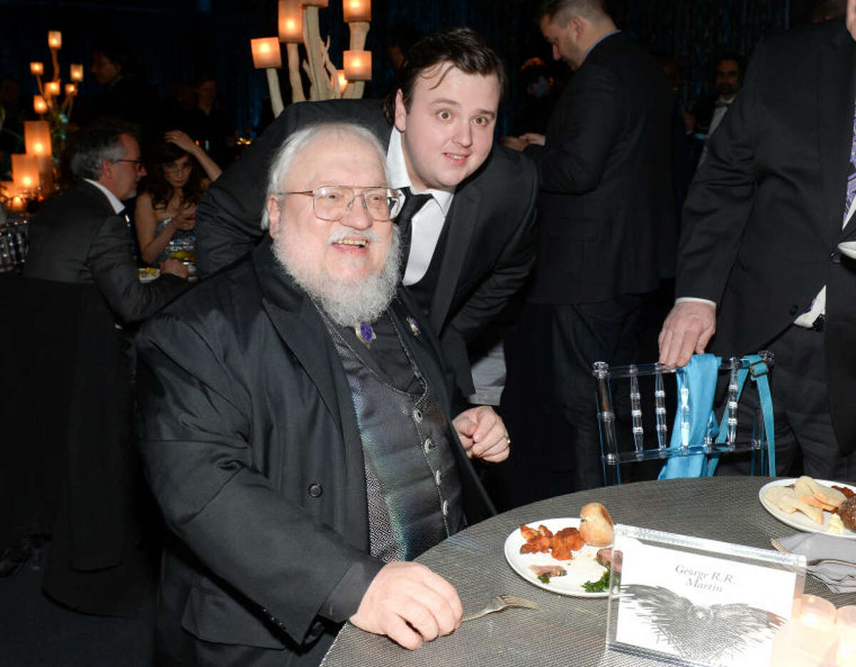 Author and co-executive producer George R.R. Martin, left, and actor John Bradley attend HBO's "Game of Thrones" fourth season premiere after party at the Museum of Natural History on Tuesday, March 18, 2014 in New York. (Photo by Evan Agostini/Invision/AP)
