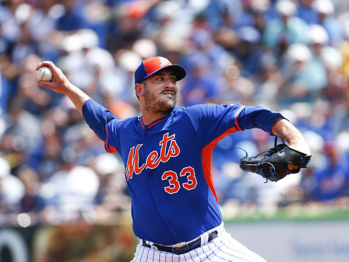 New York Mets starting pitcher Matt Harvey (33) works in the first inning of an exhibition spring training baseball game against the New York Yankees, Sunday, March 22, 2015, in Port St. Lucie, Fla. (AP Photo/John Bazemore)