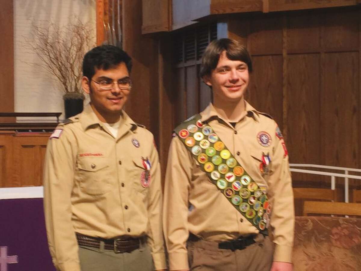 Rama Siripuram (left) and Teddy Woods (right) were awarded their Eagle badges in front of the troop, friends and family. Additionally, state Rep. Gail Lavielle presented both young men with citations commemorating their achievement on behalf of the General Assembly.