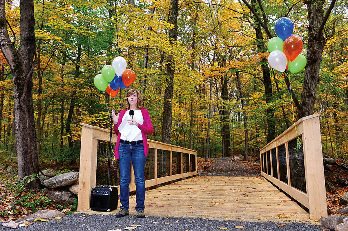Pat Sesto, chairman of the the Norwalk River Valley Trail (NRVT) project, speaks during the official opening of a new section of the east-side "Wilton Loop" Saturday.