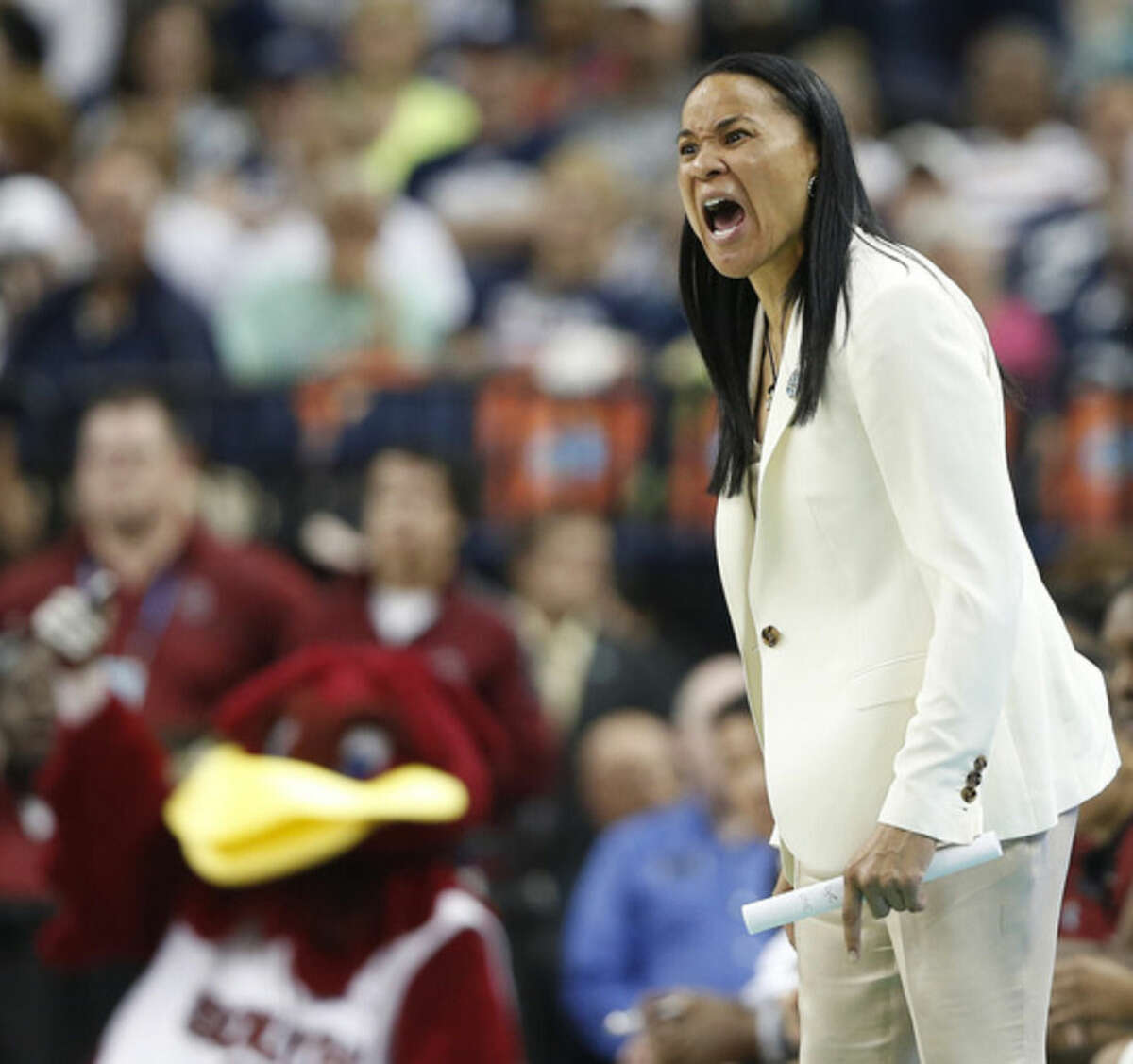 South Carolina head coach Dawn Staley speaks to players during the second half of the NCAA Women's Final Four tournament college basketball semifinal game against Notre Dame, Sunday, April 5, 2015, in Tampa, Fla. (AP Photo/Brynn Anderson)