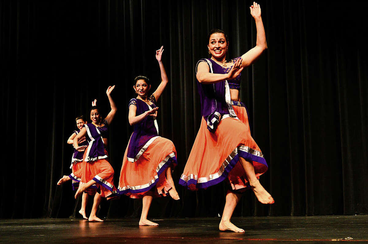 Hour photo / Erik Trautmann Wilton High School celebrates World Languages Week culminating with a performance from Ajna Dance, a traditional Indian dance troupe, Wednesday at the school.