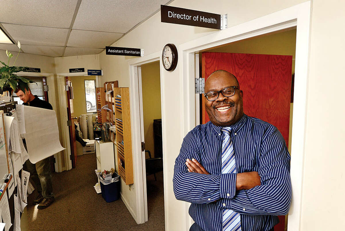 Wilton’s Director of Health Barrington Bogle stands in the doorway of his office. 