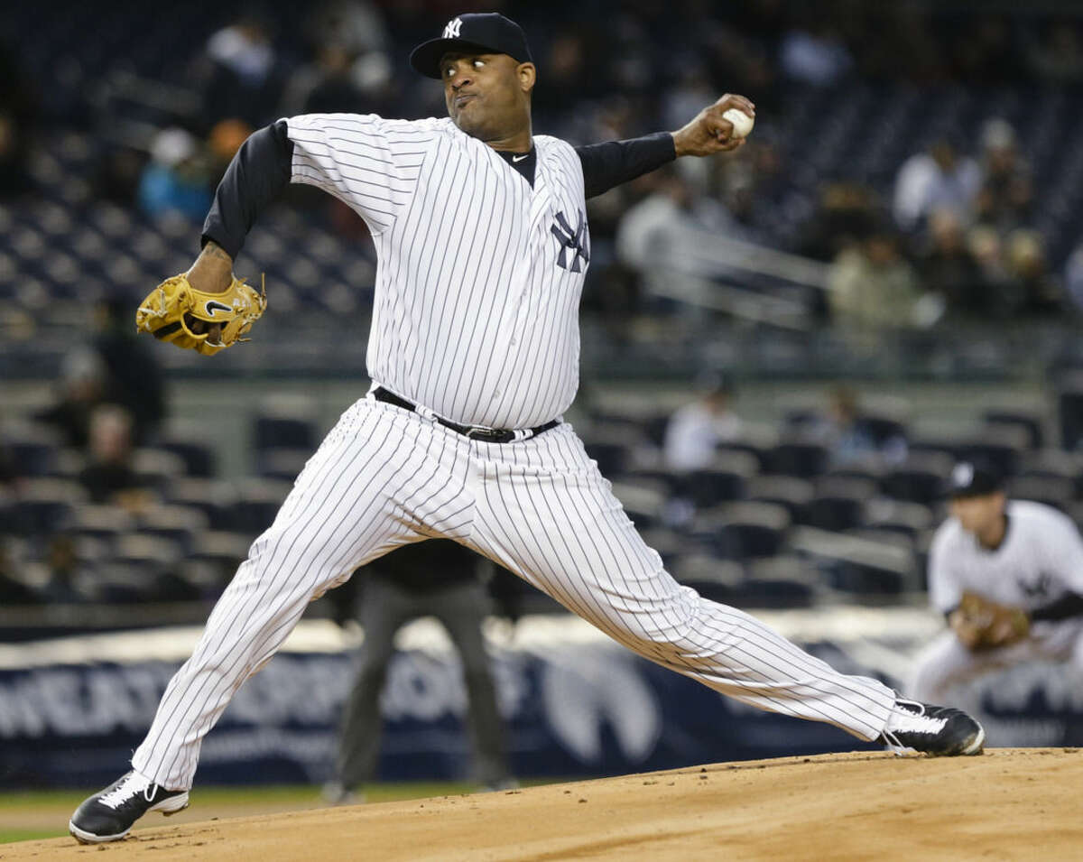 New York Yankees' CC Sabathia delivers a pitch during the first inning of a baseball game against the Toronto Blue Jays on Thursday, April 9, 2015, in New York. (AP Photo/Frank Franklin II)