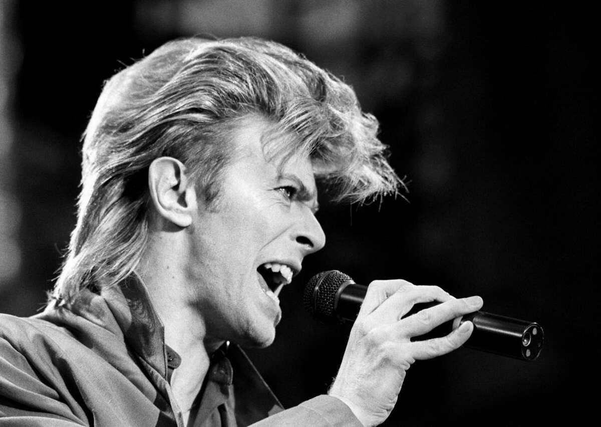 FILE - This is a June 19, 1987 file photo of David Bowie. Bowie, the other-worldly musician who broke pop and rock boundaries with his creative musicianship, nonconformity, striking visuals and a genre-bending persona he christened Ziggy Stardust, died of cancer Sunday Jan. 10, 2016. He was 69 and had just released a new album. (PA, File via AP) UNITED KINGDOM OUT NO SALES NO ARCHIVE