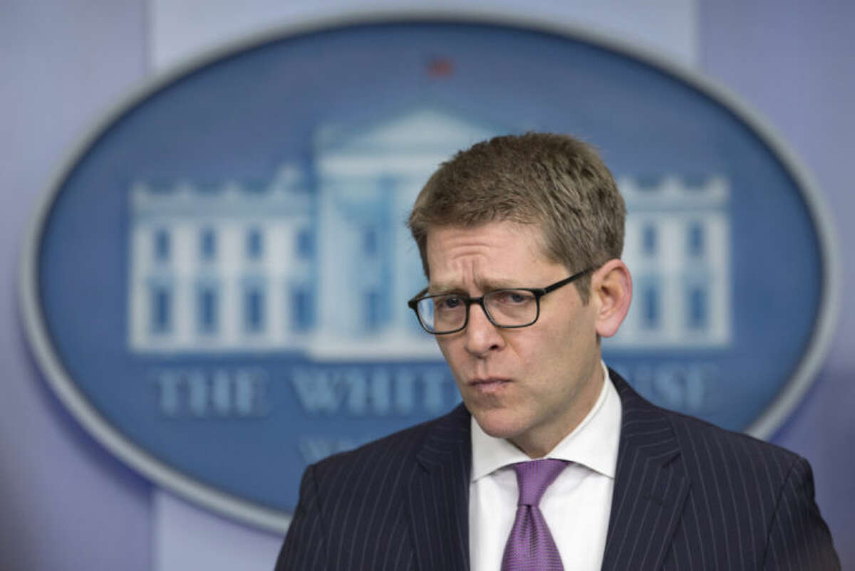 White House press secretary Jay Carney pauses to listen to a question during the daily news briefing at the White House in Washington, Thursday, April 3, 2014. Carney discussed the Fort Hood Shooting and the creation of a "Cuban Twitter". Carney said he was not aware of individuals in the White House who were aware of the program, but he also says President Barack Obama does support efforts to expand communications in Cuba. (AP Photo/Carolyn Kaster)