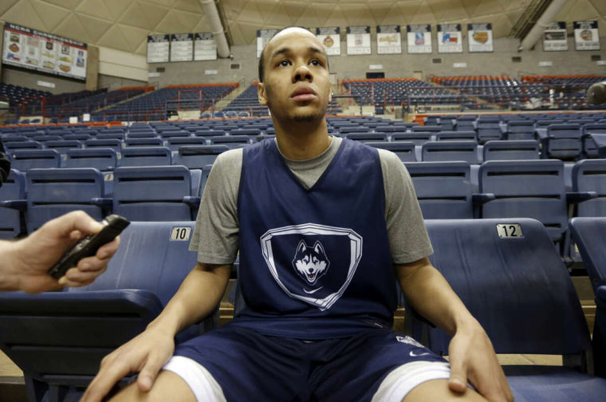 Connecticut's Shabazz Napier responds to a question following an NCAA college basketball team workout Tuesday, April 1, 2014, in Storrs, Conn. UConn will be playing Florida in the Final Four on Saturday in Dallas. (AP Photo/Steven Senne)
