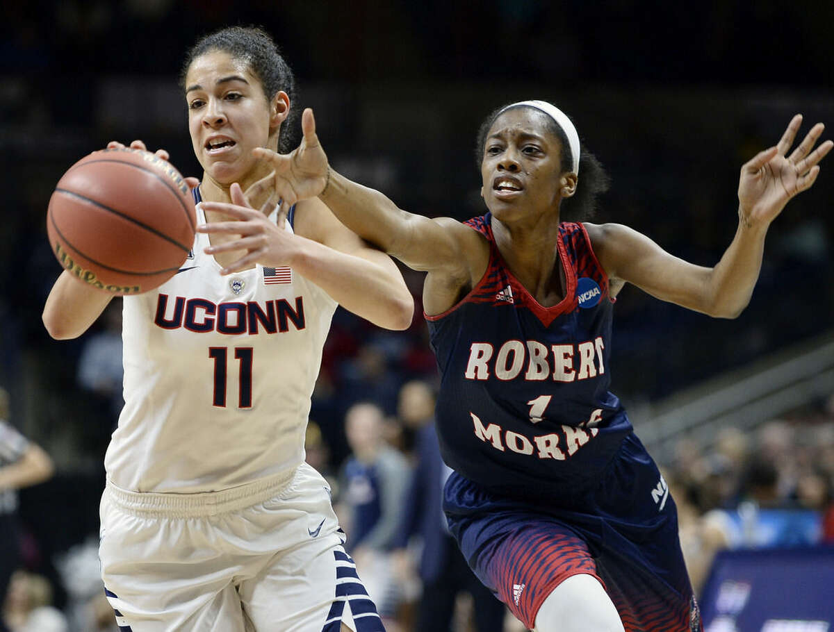 Connecticut’s Kia Nurse, left, steals the ball from Robert Morris’ Jocelynne Jones, right, during a first round women's college basketball game in the NCAA Tournament, Saturday, March 19, 2016, in Storrs, Conn. (AP Photo/Jessica Hill)