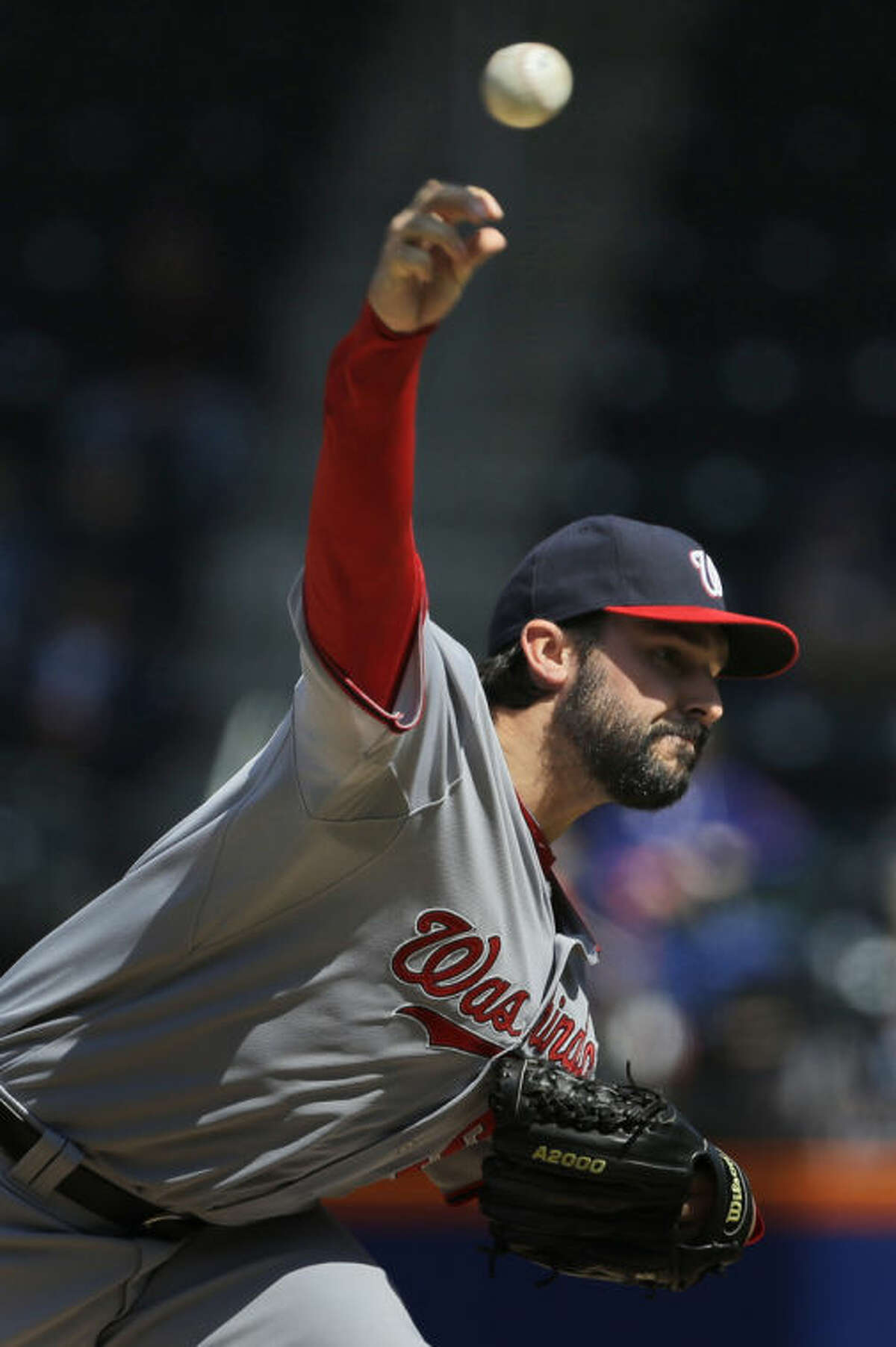 Washington Nationals pitcher Tanner Roark throws during the first inning of a baseball game against the New York Mets at Citi Field, Thursday, April 3, 2014, in New York. (AP Photo/Seth Wenig)