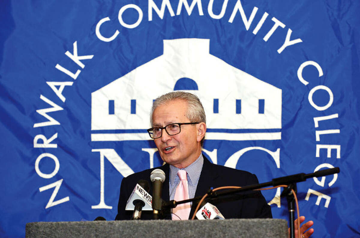 Hour photo / Erik Trautmann Chairman, the Board of Regents of Higher Education, Nick Donofrio, comments on the new educational initiative involving Norwalk Community College and Norwalk Public Schools that CT Governor Malloy announced at the college Friday. The Pathways in Technology Early College High School (P-TECH) intiative enables students to graduate with both a high school diploma and an Associates in Applied Science degree through the college's Norwalk Early College Academy.