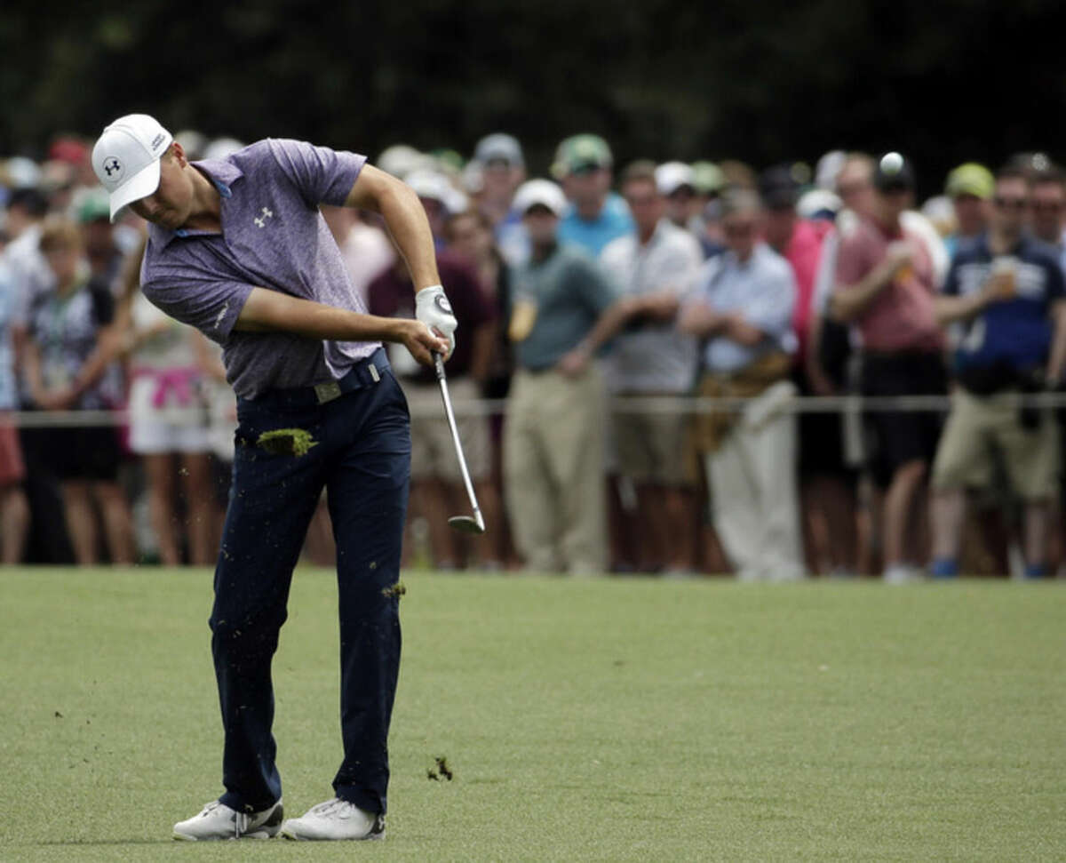 Jordan Spieth hits on the 15th fairway during the second round of the Masters golf tournament Friday, April 10, 2015, in Augusta, Ga. (AP Photo/Chris Carlson)
