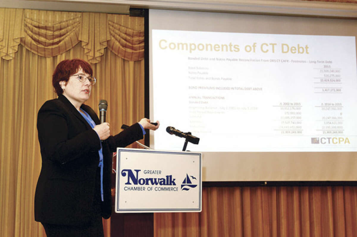 Hour photo / Erik Trautmann Julie McNeal, CPA and director of finance and operations for the Connecticut Society of CPAs and one of the featured panelists in the Greater Norwalk Chamber of Commerce presentation, Connecticut State Budget: Fact and Fiction, speaks at the Norwalk Inn Tuesday morning.