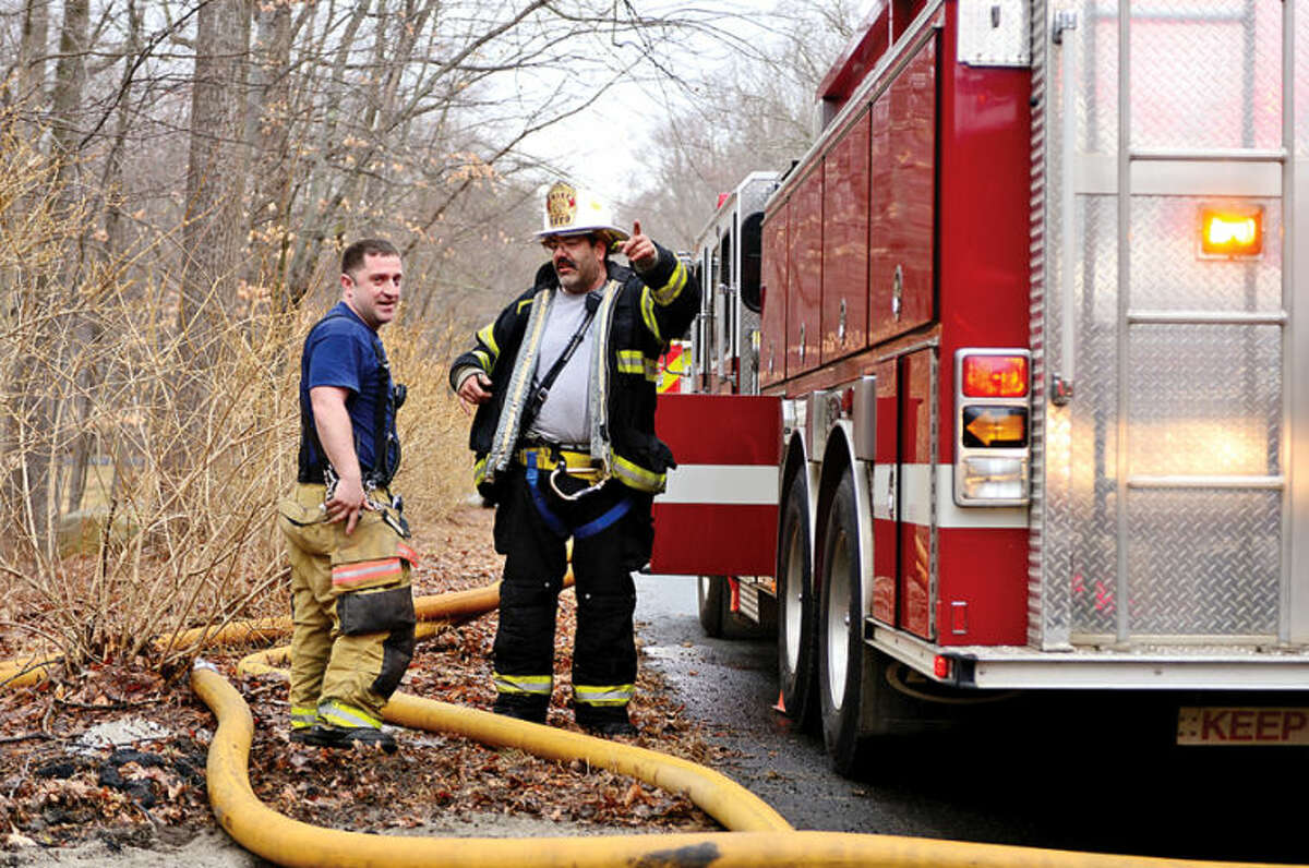 Wilton and Weston fire departments respond to a house fire at 211 Linden Tree Road in Wilton Saturday morning.