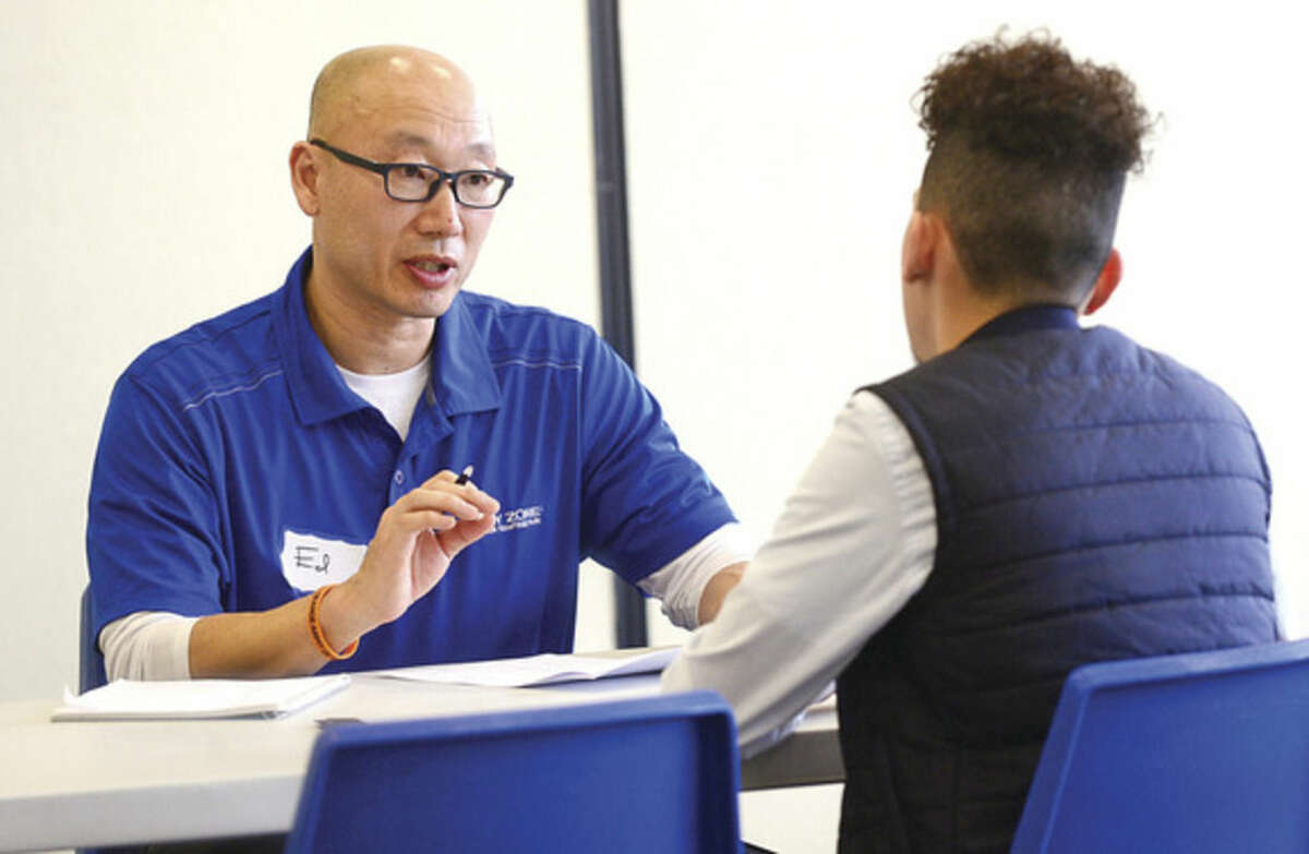 Hour photo / Erik Trautmann Sky Zone franchise owner Ed Kim interviews Abriel Gonzalez during the Sky Zone Job Fair in an effort to hire 120 people for their new location opening in Norwalk at the end of March.
