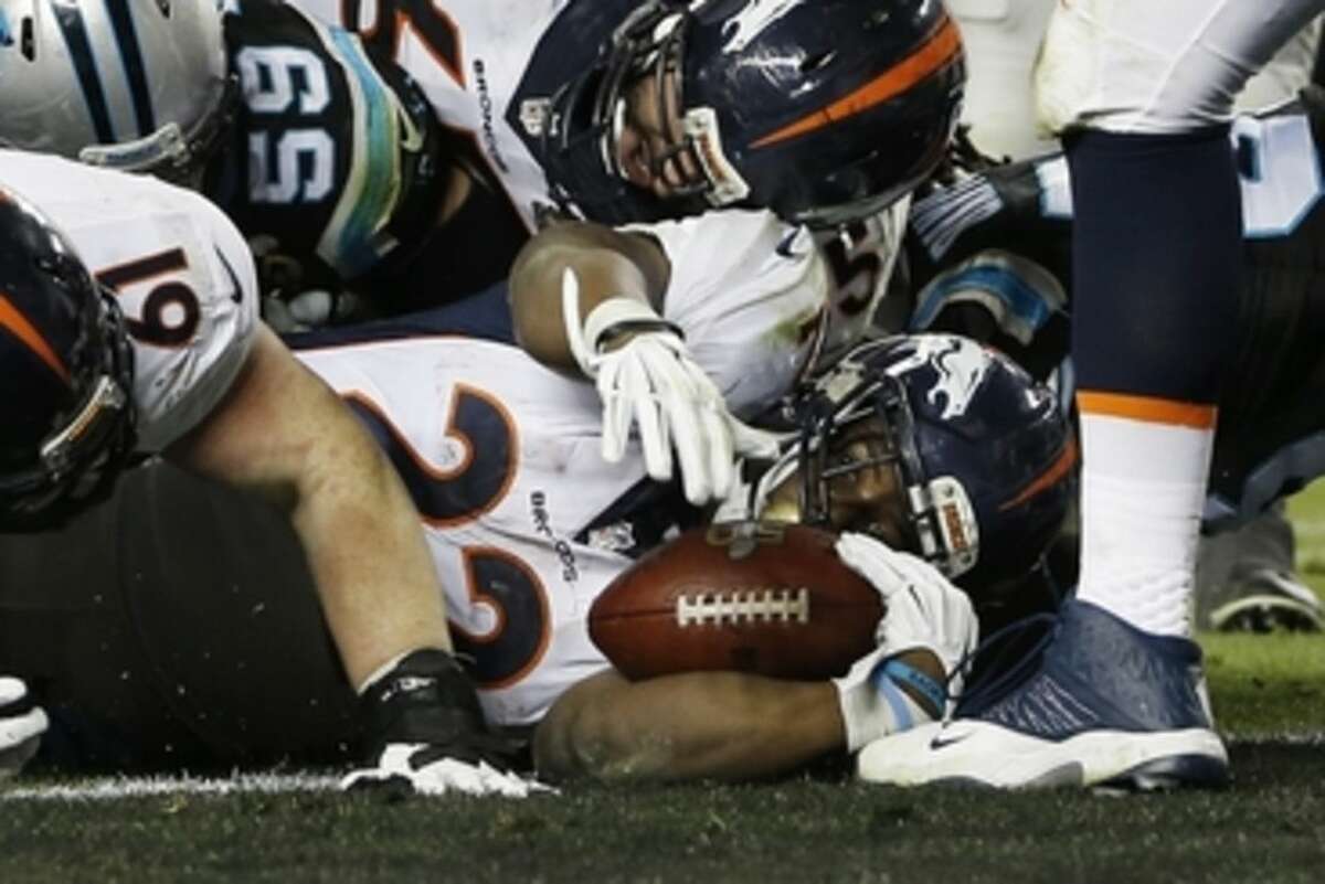 Denver Broncos’ C.J. Anderson (22) scores a touchdown against the Carolina Panthers during the second half of the NFL Super Bowl 50 football game Sunday, Feb. 7, 2016, in Santa Clara, Calif. (AP Photo/Matt Slocum)