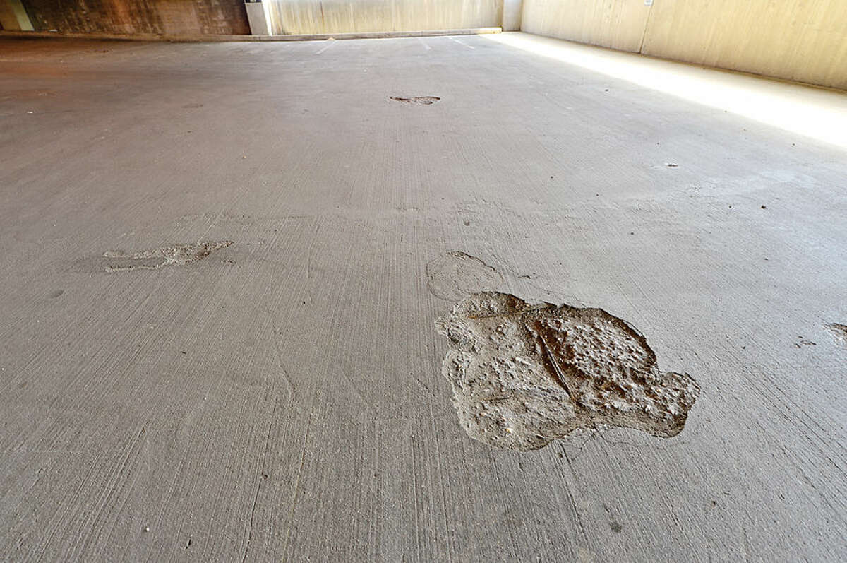 The Connecticut Department of Transportation has partially closed its 28-year-old parking garage in downtown Stamford after chunks of concrete fell through the third floor to the second-level deck over the weekend.