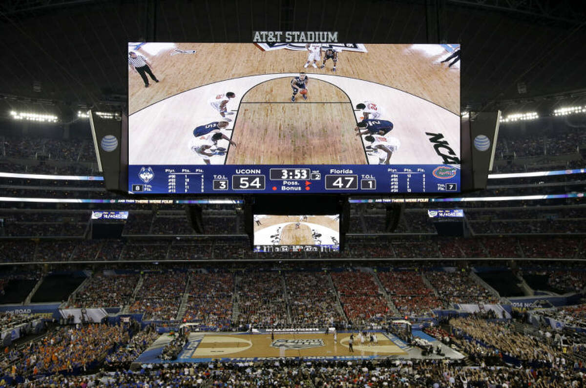 Connecticut guard Shabazz Napier takes a foul shot against Florida during the second half of the NCAA Final Four tournament college basketball semifinal game Saturday, April 5, 2014, in Arlington, Texas. Connecticut won 63-53. (AP Photo/Tony Gutierrez)