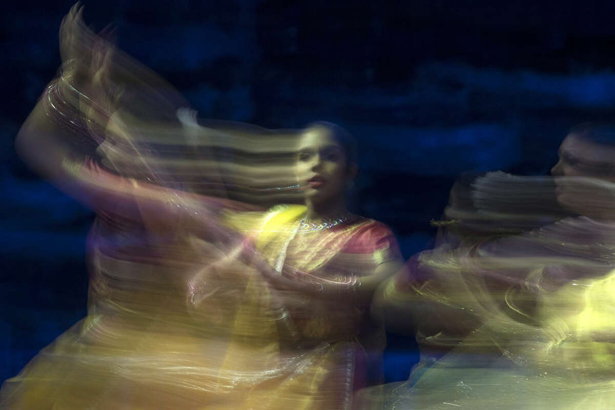 A dancer performs ahead of an event attended by Indian Prime Minister Narendra Modi and Canadian Prime Minister Stephen Harper in Toronto, Wednesday, April 15 2015. (Chris Young/The Canadian Press via AP) MANDATORY CREDIT