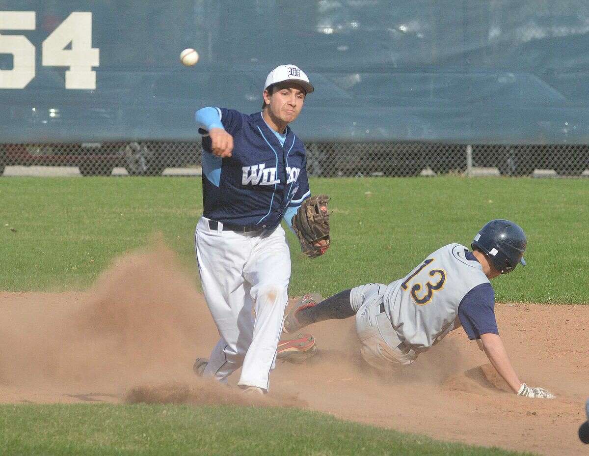 Hour Photo/Alex von Kleydorff Wiltons #31 Dillon Lafari makes the out and the throw to first vs Weston