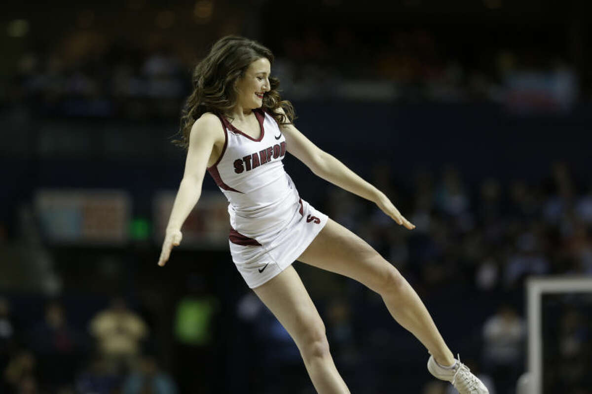 Stanford cheerleaders perform against Connecticut during the first half of the semifinal game in the Final Four of the NCAA women's college basketball tournament, Sunday, April 6, 2014, in Nashville, Tenn. (AP Photo/Mark Humphrey)