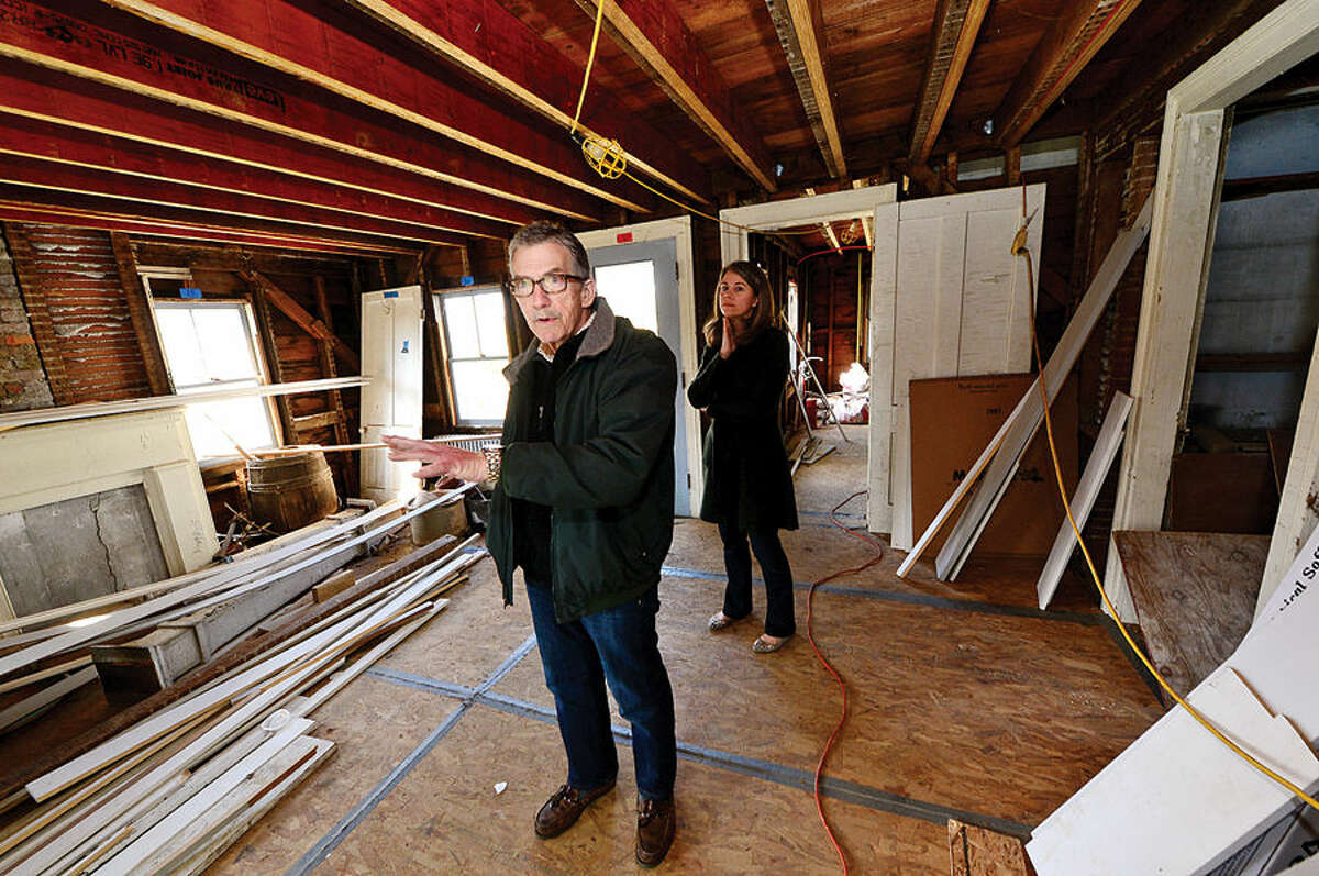 President of the Friends of Ambler Farm, Neil Gluckin, and Ambler Farm administrative coordinator, Robin Clune, give a tour of the Raymond-Ambler Farmhouse to show some of proposed renovations planned for the historic building.